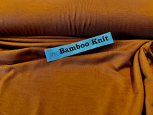 Load image into Gallery viewer, Cognac Orange 95% Bamboo 5% Spandex.    1/4 Meter Price