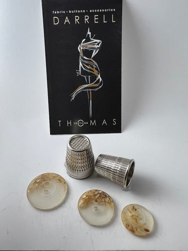 Beige Speckled 2 Hole Button.   Price per Button