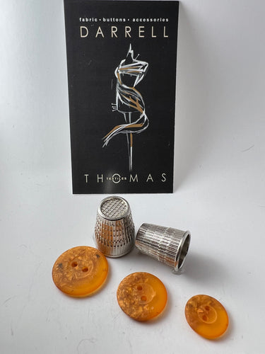 Orange Speckled 2 Hole Button.   Price per Button