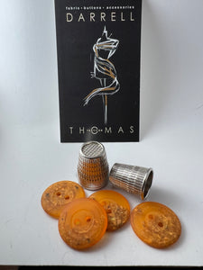 Orange Speckled 2 Hole Button.   Price per Button