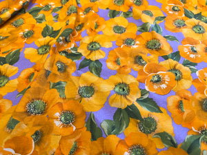 Orange Floral on Lavender two way stretch 95% Cotton 5% Elastane.  1/4 Metre Price
