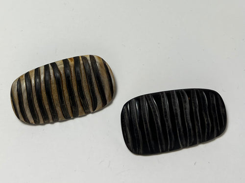 Small Brown Carved Horn Button.   Price per Button