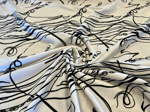 #1205 White & Black Abstract knit 2 way stretch. 95% Cotton 5% Elastane Remnant