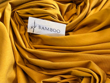 Load image into Gallery viewer, Goldenrod 92% Bamboo 8% Spandex Knit.    1/4 Meter Price