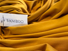 Load image into Gallery viewer, Goldenrod 92% Bamboo 8% Spandex Knit.    1/4 Meter Price