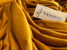 Load image into Gallery viewer, Goldenrod 92% Bamboo 8% Spandex Knit.    1/4 Meter Price