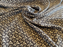 Load image into Gallery viewer, Signature Logo Brown &amp; Gold Print 100% Silk     1/4 Meter Price
