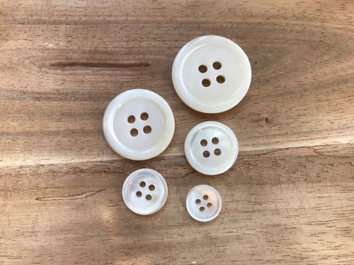 Off-White MOP Suiting Buttons.  Price per Button
