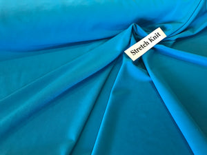 Peacock 94% Polyester 6% Spandex Knit.   1/4 Meter Price