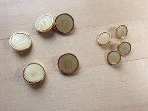 Designer Gold Rimmed Yellow Button.   Price per Button