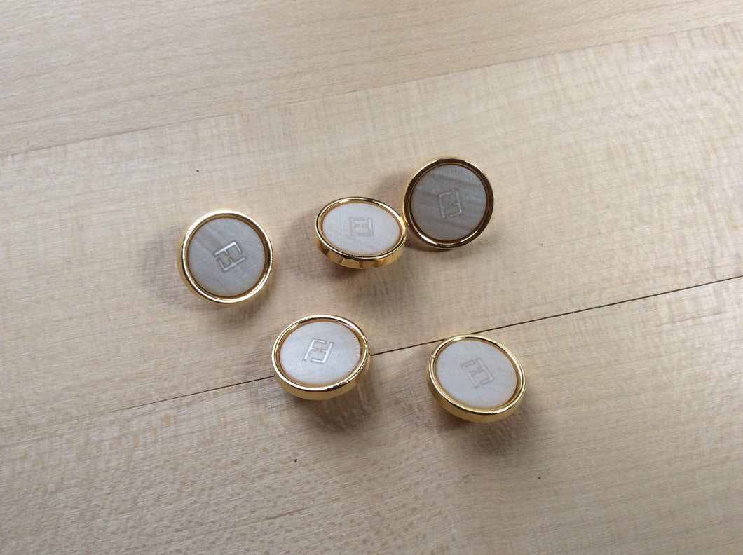 Designer Gold Rimmed Beige Button.   Price per Button