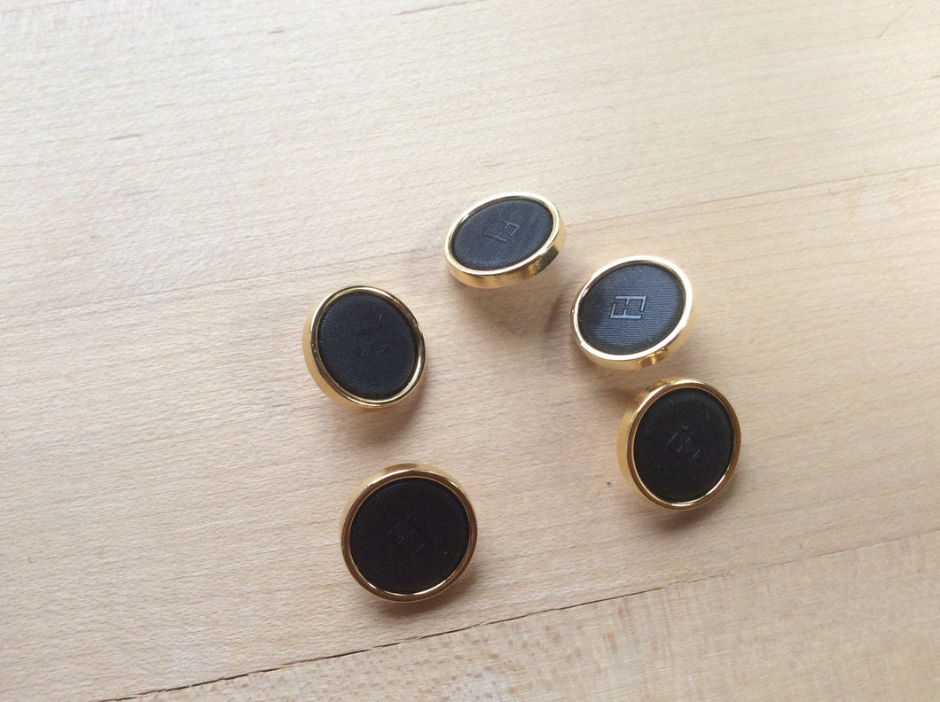 Designer Gold Rimmed Black Button.    Price per Button