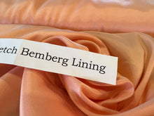 Load image into Gallery viewer, Peach/Coral Stretch Bemberg Lining     1/4 Meter Price