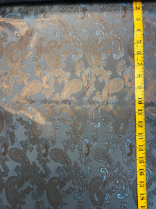 Bronze/Pale Blue Viscose Paisley Lining.  1/4 Metre Price