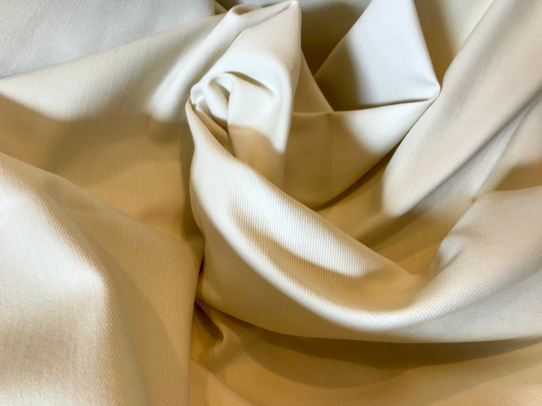 Ivory Denim 68% Cotton 30% Repreve (Recycled Poly) 2% Lycra.    1/4 Meter Price