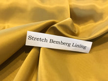 Load image into Gallery viewer, Goldenrod Stretch Bemberg Lining.     1/4 Meter Price