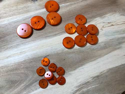 Orange MOP.   Price per Button