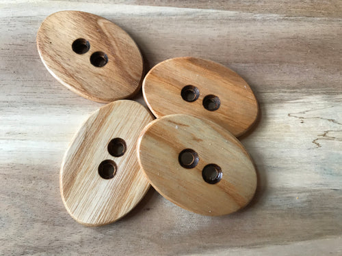 White Ash Oval Button.    Price per Button