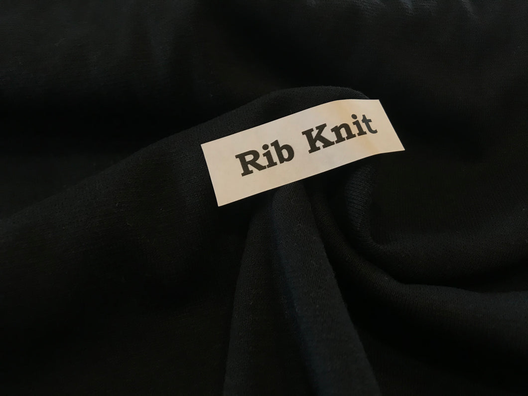 Black 48% polyester 48% cotton 4% spandex Rib knit.  1/4 Metre Price