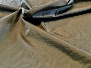 Khaki 100% Nylon Water Repellent Raincoating.     1/4 Metre Price