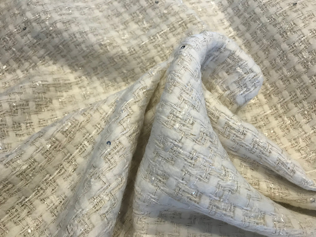 White/Ivory Couture Tweed  35% Wool 15% Acrylic 15% Polyester 10% Mohair 10% Alpaca 10% Cotton 5% Other.   1/4 Meter Price