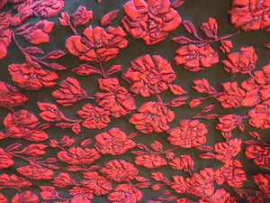 Red Flower on Matelasse 54% polyester 36% nylon 10% Metallic.  1/4 Metre Price