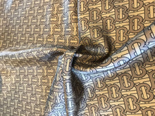 Load image into Gallery viewer, Signature Logo Gold Print 100% Silk     1/4 Meter Price
