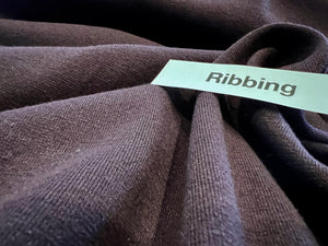 Raisin 48% Polyester 48% Cotton 4% Spandex ribbing knit.  1/4 Metre Price