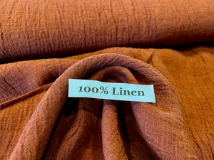 Crinkle Pottery Orange 100% Linen.   1/4 Metre Price